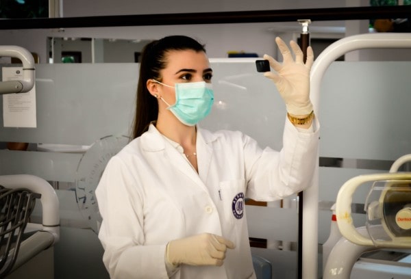 female doctor wearing white labcoat in medical facility